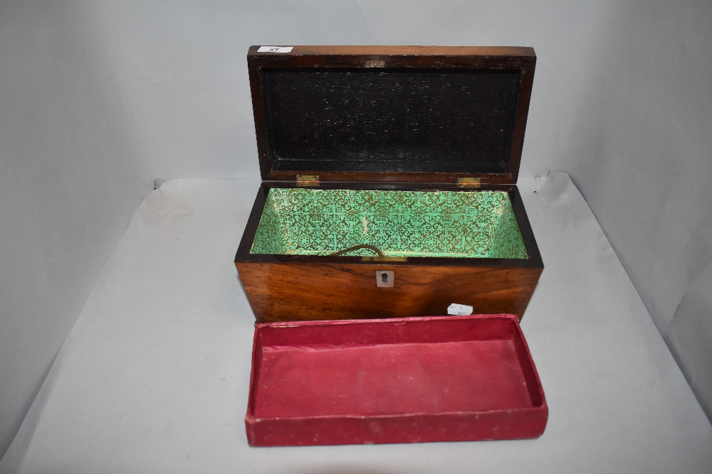 A Victorian rosewood casket form tea caddy on bun feet - Image 2 of 2