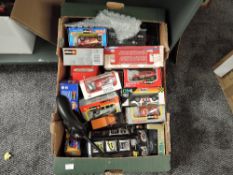 A box of various scale diecasts including Vitesse, Burago and similar, most boxed