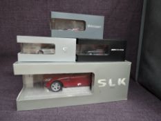 Four Paul's Model Art diecasts, 1:18 scale Mercedes SLK Class, 1:43 scale Mercedes Benz SLK 55 C