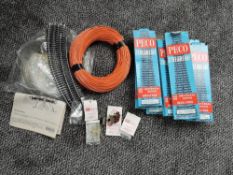 Eight Peco HO/OO gauge Left Hand, Right Hand and Y Turnouts, all boxed along with accessories and
