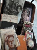 A suitcase containing a selection of items of Ivor Novello interest to include a large frame black