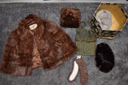 A varied box of fur to include hats, muff and cape.