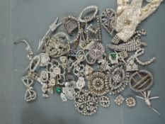 A beautiful collection of rhinestone buckles, dress clips, a tiara, brooches and much more, a very