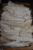 A wonderful assortment of white work table linen,embroidered, damask, drawn thread work and cut-work