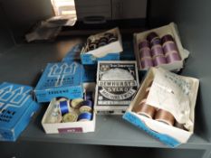 Around fifteen boxes of vintage mixed threads,many reels in this lot and many colours.