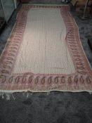 A large Victorian crinoline shawl,around 1870, of printed cotton having unusual cream and lilac