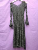 A 1930s lace dress having long sleeves with wide cuffs, AF.