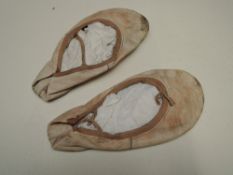 A pair of ballet shoes which belonged to Erik Bruhn, principal dancer with the Royal Copenhagen