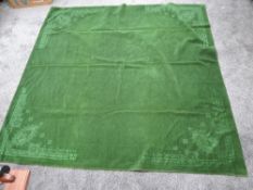 A vintage moss green Chinese throw, having embossed pattern.