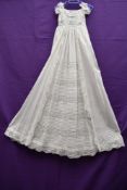 A Victorian christening gown, having pin tuck and Broderie Anglais detailing.