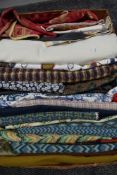 A box of mixed high quality fabrics, some lovely prints and wools,woven panels and more.