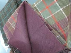 Two vintage rugs, one double sided with tartan to one side and plain purple to reverse.