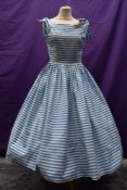 A 1950s blue and white striped Horrockses fashions cotton sundress having faux ties to top of