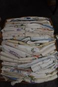 A box of around one hundred items of embroidered table linen, including tray cloths,table cloths and