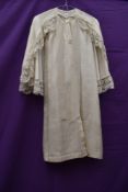 An unusual antique cream cape or shawl, possibly ceremonial, christening or confirmation.