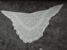 A fine lawn cotton Victorian shawl having embroidery and scalloped edge.