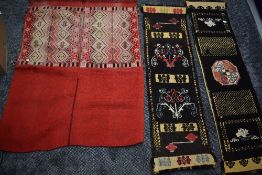 Three ethnic styled wall hangings.