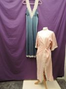 A vintage kimono style dressing gown in pink cotton with white embroidery and a Nylon nightdress.