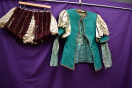 A green felt tunic and a set of Elizabethan style breeches, around early to mid 20th century, Worn