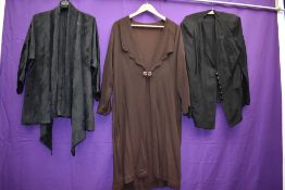 A 1930s Art Deco coat in brown crepe and two similar jackets/cover ups in black.