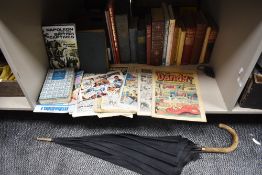 Antique and later library volumes including Dandy comics and Churchill the Struggle for Survival