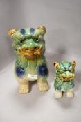 20th century Sancai glazed Chinese dogs of fo one large example at 25cm tall and a smaller figure