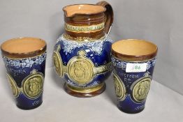 A Victorian Doulton Lambeth glazed jug and two beakers , celebrating Queen Victoria 60th Jubilee,