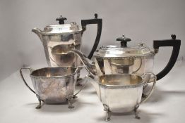 A Mappin and Webb plated set comprising of tea pot,milk jug, sugar basin and hot water jug.