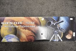 A Saxo 767AZ telescope, boxed