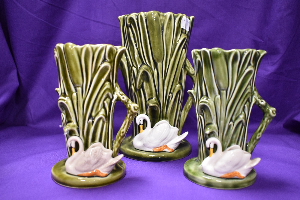 A collection of mid century Sylvac vases and planters, having swans to some and others with stylised - Image 3 of 3