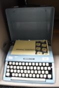 Mid century Imperial 200 typewriter in baby blue with case etc