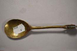 An unusual antique multi purpose brass pie crimper or pastry jigger with spoon to one end.