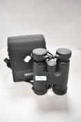 20th century binoculars Opticron 10x42 LE WP with case etc