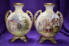 A pair of late 19th Century English moon flasks, having painted pictorial inns to one face and