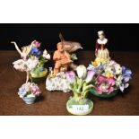 A selection of figures and figurines including terracotta and Derby