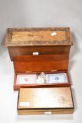 Two vintage boxes, one of carved oak in the form of a kist, also included is a boxed set of