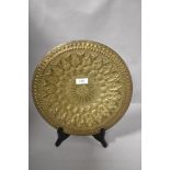 20th century Turkish brass plate having ornate chase work decoration marked Naki Filali Ahmed