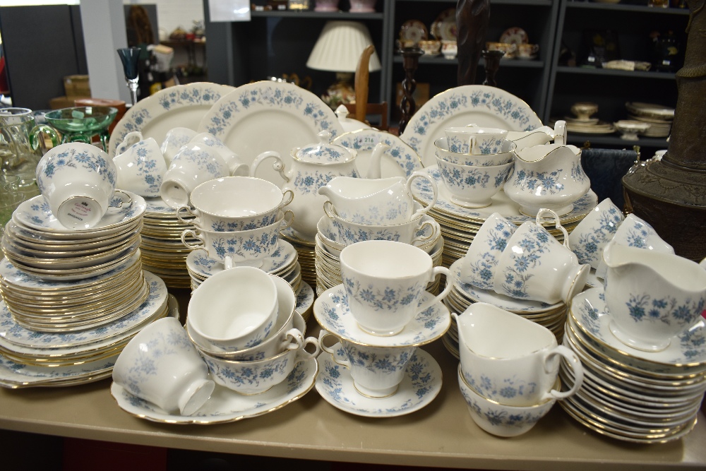 A large collection of Colcough china having white ground with blue floral pattern,plates,cups and