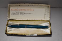 A Parker 45 cartridge/convertible pen in teal, circa 1960s-80s, with box.