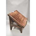 Victorian book or bible rest having a Gothic design carved in mahogany