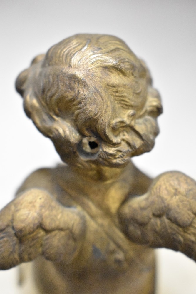 An early 20th century alabaster mantel clock having gilt cherub to top, enamel face and Roman - Image 6 of 6