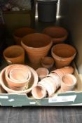 A selection of vintage terracotta plant pots in various sizes and designs