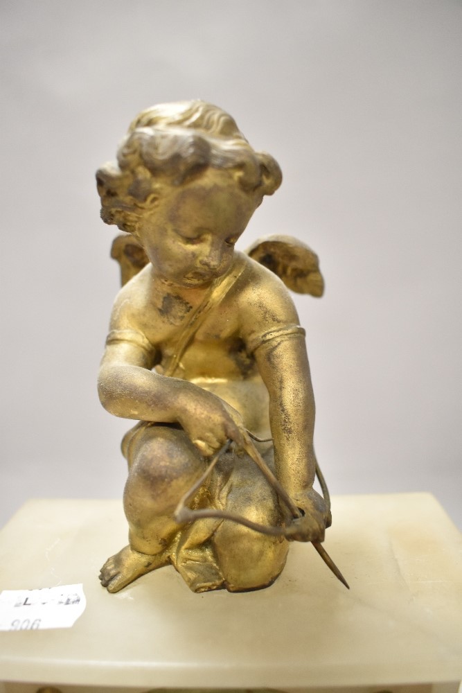 An early 20th century alabaster mantel clock having gilt cherub to top, enamel face and Roman - Image 4 of 6