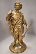 A spelter figure, modelled as Roman fisherman, height approx. 29cm , overpainted in bronze colour