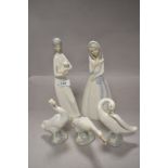 A selection of Lladro and similar figures including ducks/geese and ladies