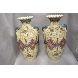 A pair of large Oriental style two handled vases having tube lined style decoration, height approx