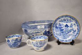 A selection of blue and white ceramics including Chinese tea cups and Arcadian 'Chariots' fruit