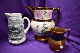 An antique jug to include large lustre jug with floral design in commemoration of Prince Albert