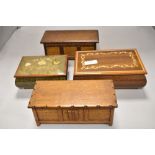 Four vintage jewellery boxes including two modelled as oak kists