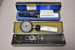 20th century medical devices including Klein Keratoscope and two Ophthalmoscope